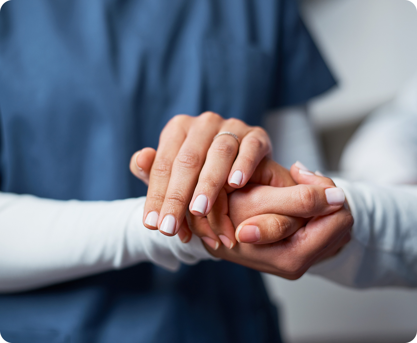 Hands offering comfort and support, close-up.